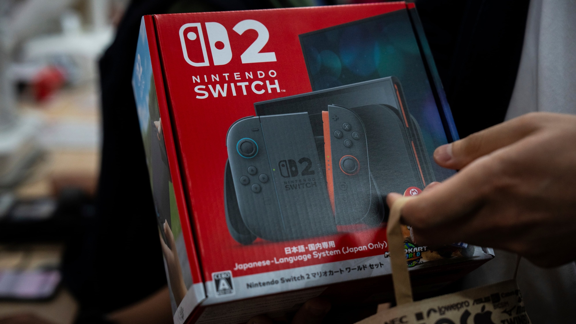 Fans line up in the rain for midnight launch of Nintendo Switch 2